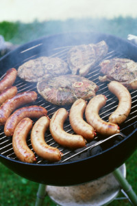 Grilled meat on barbecue grill --- Image by Â© Royalty-Free/Corbis